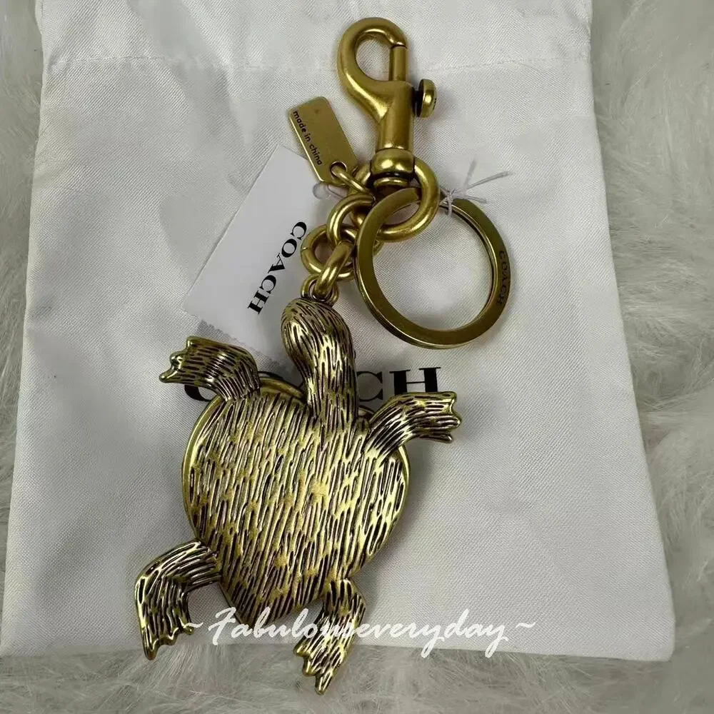 Coach Turtle Bag Charm In Brass/Brown Multi CEA07 NWT